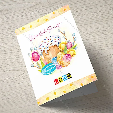 Akwarelowe ciasto z lukrem i posypką, obok jaja, tulipany i bazie, nad nim napis życzeń