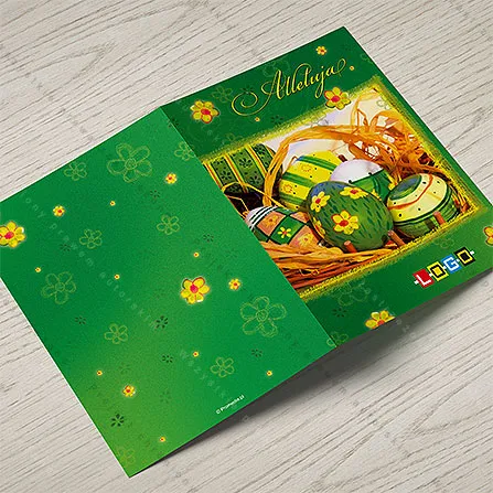 Karnet WN1-124 Malowane jaja i złote Alleluja, otwarty na stole, środek z miejscem na życzenia i logo