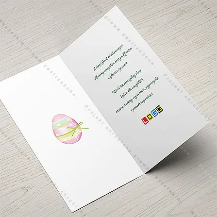 Karnet WN3-162 Wiosenny owal w poprzeczne pasy, otwarty na stole, środek z miejscem na życzenia i logo